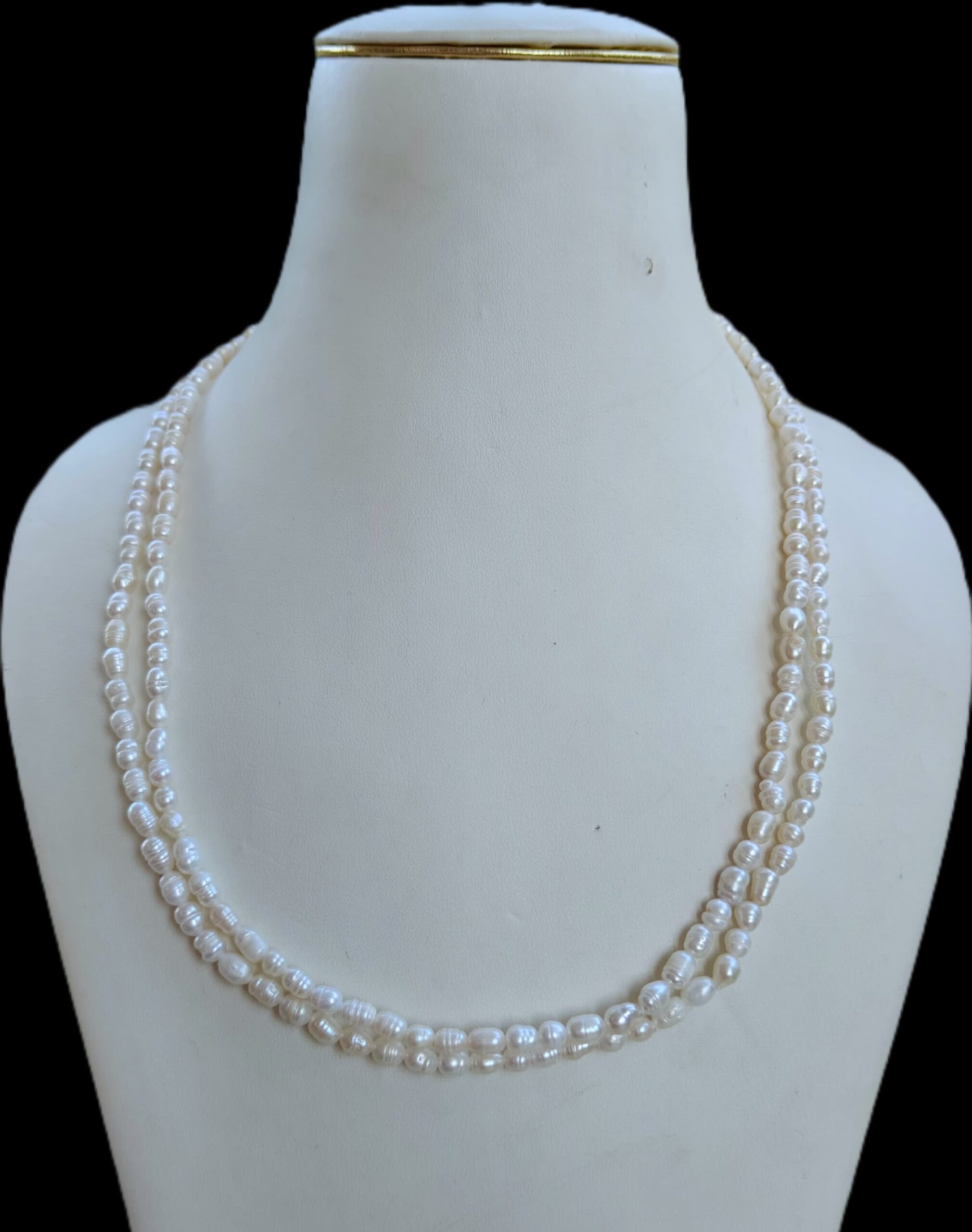 two-layer mala crafted from lustrous freshwater rice pearls
