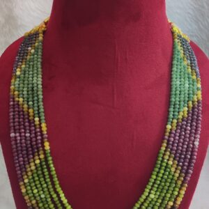 The Onex Necklace is a statement piece that blends artistry with elegance. Featuring multiple strands of finely crafted beads, it creates a cascading effect that enhances any outfit with vibrant sophistication.